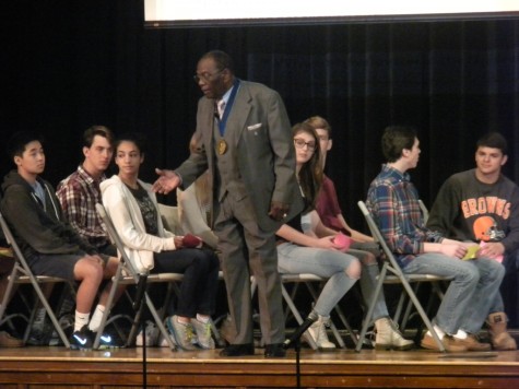 Gathered on stage to simulate a bus, students experienced first hand discrimination during the Civil Rights era.