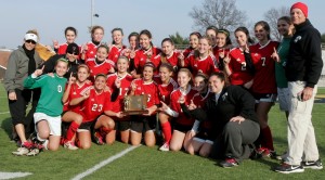 Girls’ varsity soccer, playing with heart
