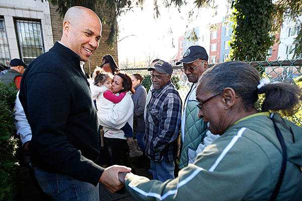 Meeting with Newark residents before his food stamp pledge, Mayor Cory Booker brings a lot to the table -- but does he bring it too soon?