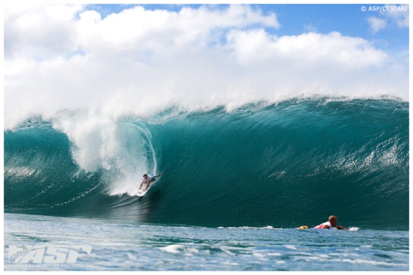 Riding gnarly waves, surfer Joel Parkinson won this years Pipe Masters.  