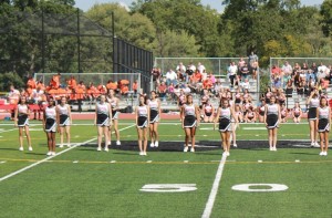 Ready to perform, the Cheerleaders make their way onto the field.  