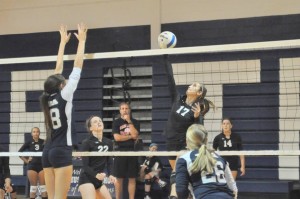 Demonstrating their skills, the GRHS Volleyball team is determined to keep winning.  