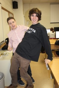 Exhausted from their twelfth game of catch today, F. Timothy Francis and Dylan Kennedy enter the newsroom.