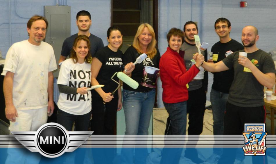 Suzanne Barron, with members of MINI USA, volunteered their hours to paint the new Christopher's Comic Corner at School 21.