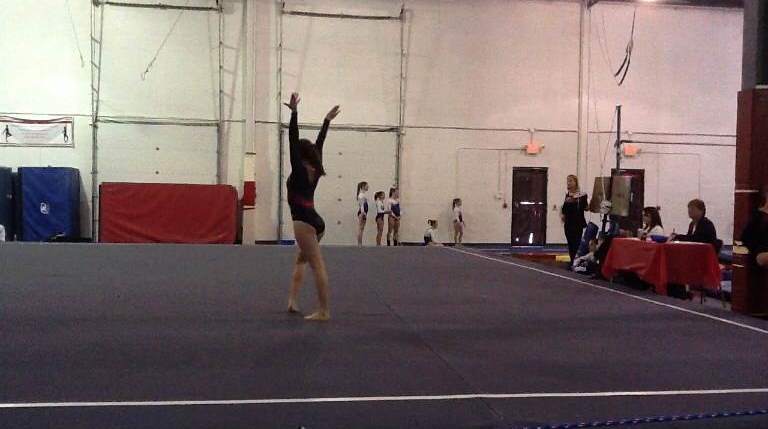 Performing+her+floor+routine%2C+Sydney+Struble+competes+in+a+competition+prior+to+her+injury.++