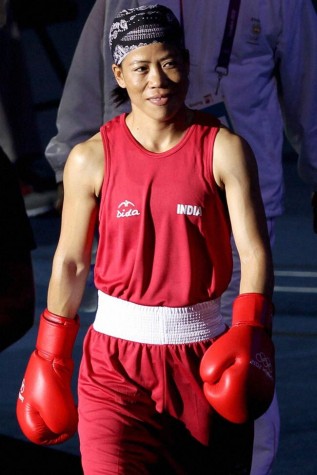 Image from : http://indiatoday.intoday.in/gallery/olympics-mary-kom-settles-for-bronze/1/7542.html