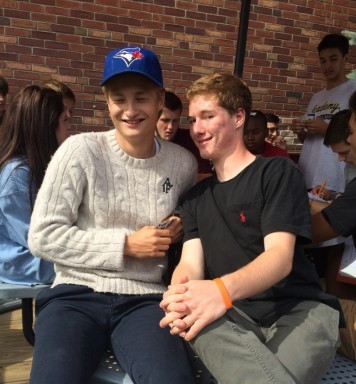 Mathias Weckstrom (left) enjoys lunch because its time he gets to spend with his friends.