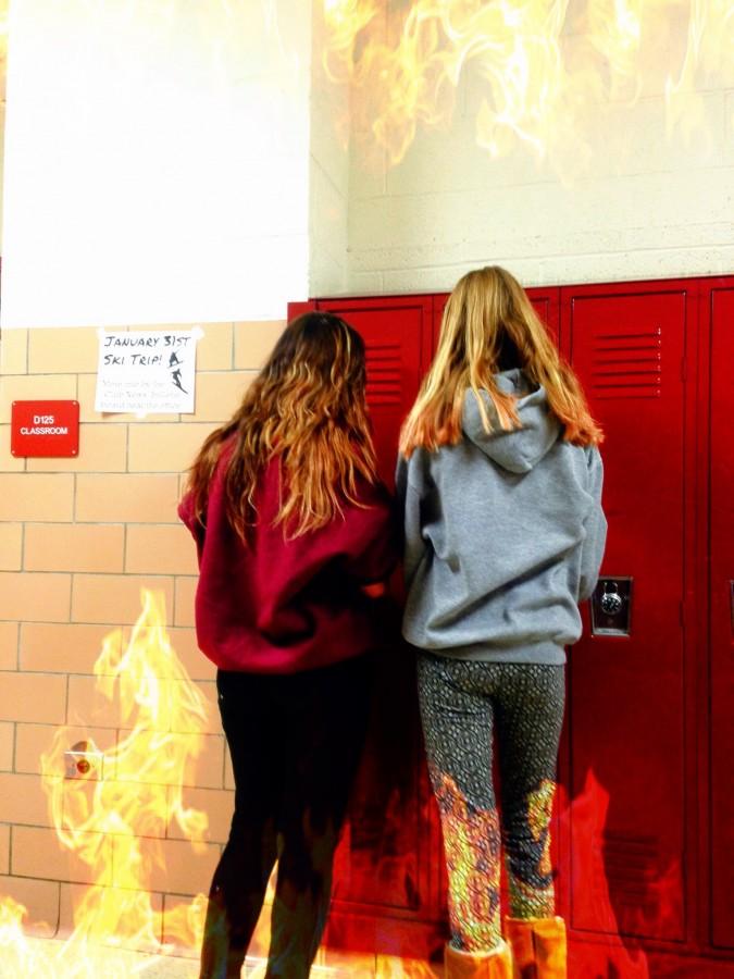 Two freshmen, Julia Blando and Olivia Lorenzo, socializing at their lockers wearing their favorite pants, leggings