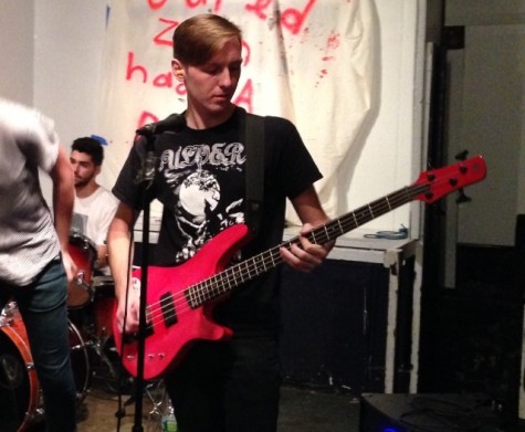 Bradley playing bass at a show in New York City.