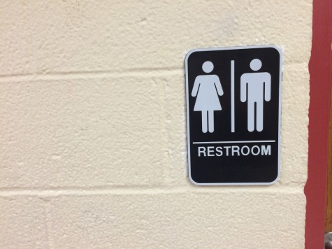 A sign indicating the unisex bathroom located in the junior hallway was installed shortly after winter break, a step toward making the school more accessible.  