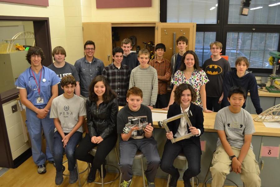 The robotics team, along with their advisers Luckenbill and Resnick, pose for their team picture for the yearbook. 