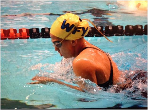 Bridget swimming breaststroke.