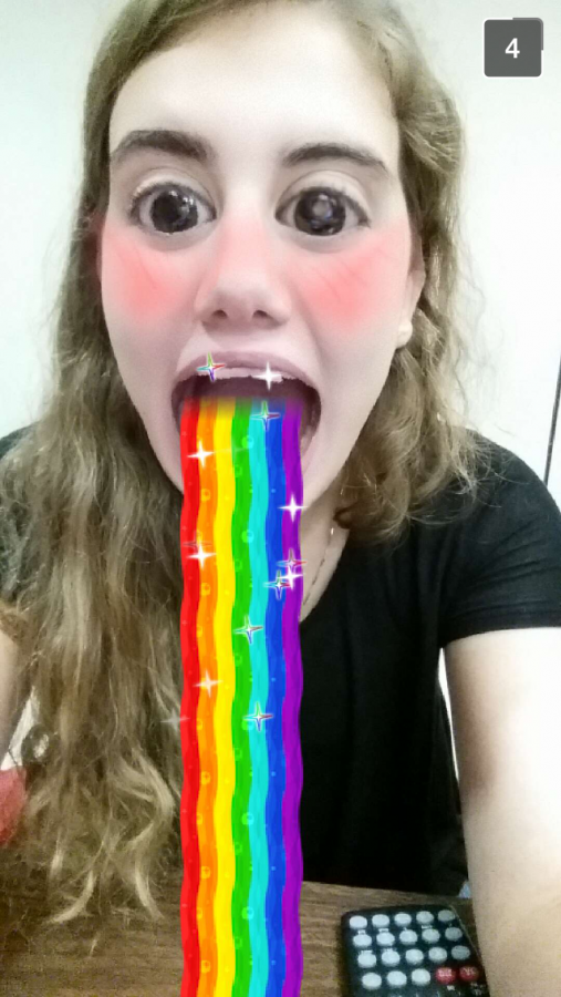 Amanda+Eichman%2C+a+sophomore+uses+the+new+Snapchat+update+with+the+rainbow+Lense