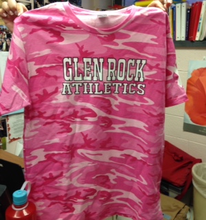 Zimmerman, varsity tennis coach, organized a t-shirt sale and raised over $800 for breast cancer research.