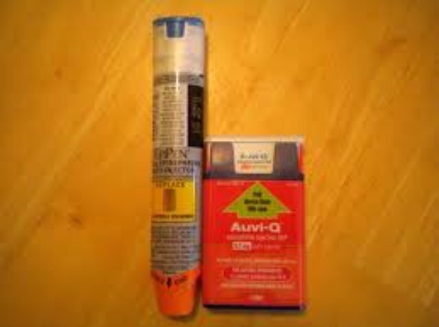 On the left is an EpiPen, the schools current auto-injector, and on the right is a recalled Auvi-Q auto-injector.