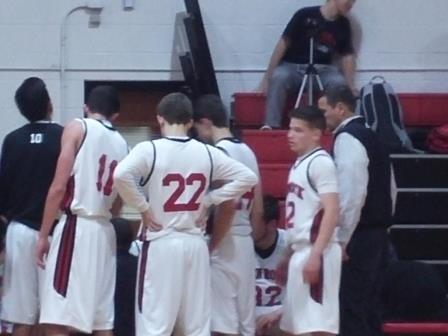 Glen Rock huddles before the third quarter begins