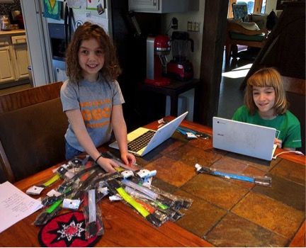 Kurt (10) and Maya (8), Shapiro’s two children, helped him sort through the armbands and personally deliver them to each household. 