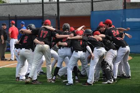 The baseball team huddling prior to an 11-1 against the Lodi Rams