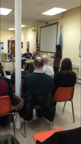 Singh reads her VFW essay to a crowded room full of veterans and other spectators.