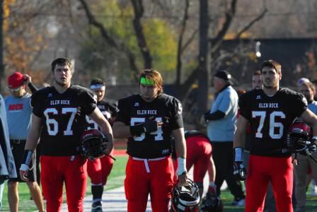 Seniors Mike O’Hagan, Matt Lange and Jeremy Lipsky during the national anthem.
