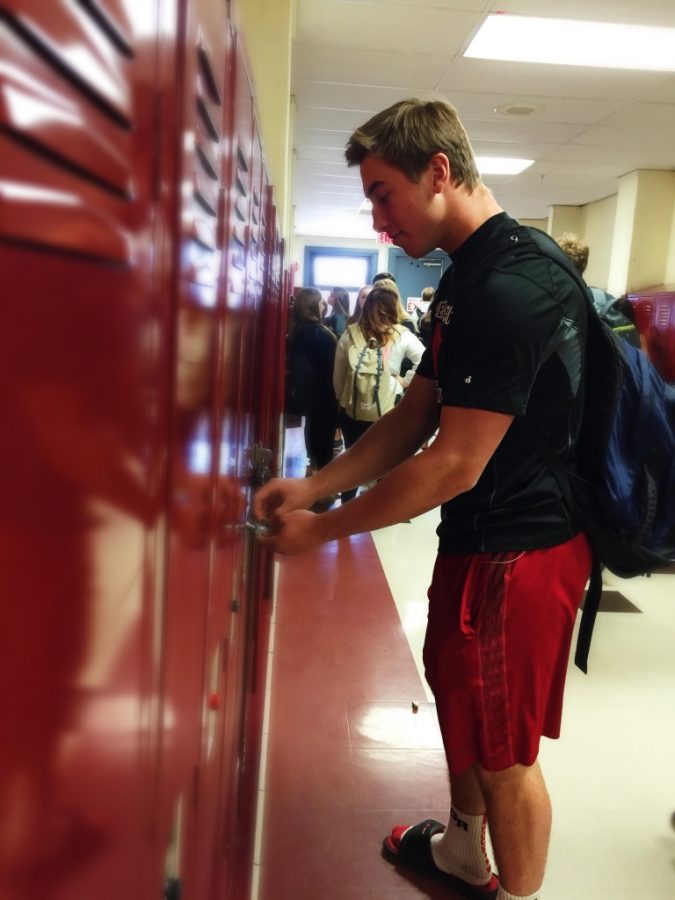 Michael between classes at his locker sophomore year. 