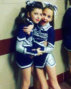 Brenna Drummond is on the left next to Sophia Arnao. This was taken of the two best friends before performing at a competition in 2009 on the St. Anne's cheerleading team. 