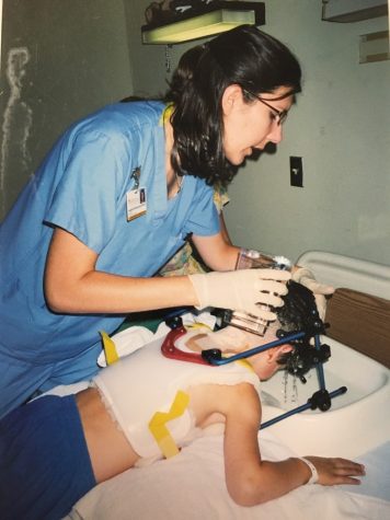 The nurses in the hospital assisted Weiss when he had to wash his hair. Since he had bath like this for a year, his parents bought a massage table, so they could clean him from home. 