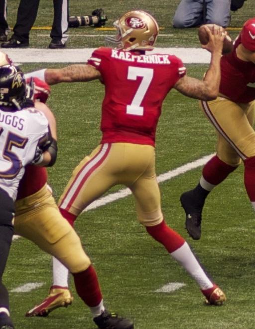 San Francisco 49ers starting quarterback is protesting American racism by kneeling during the National Anthem. 