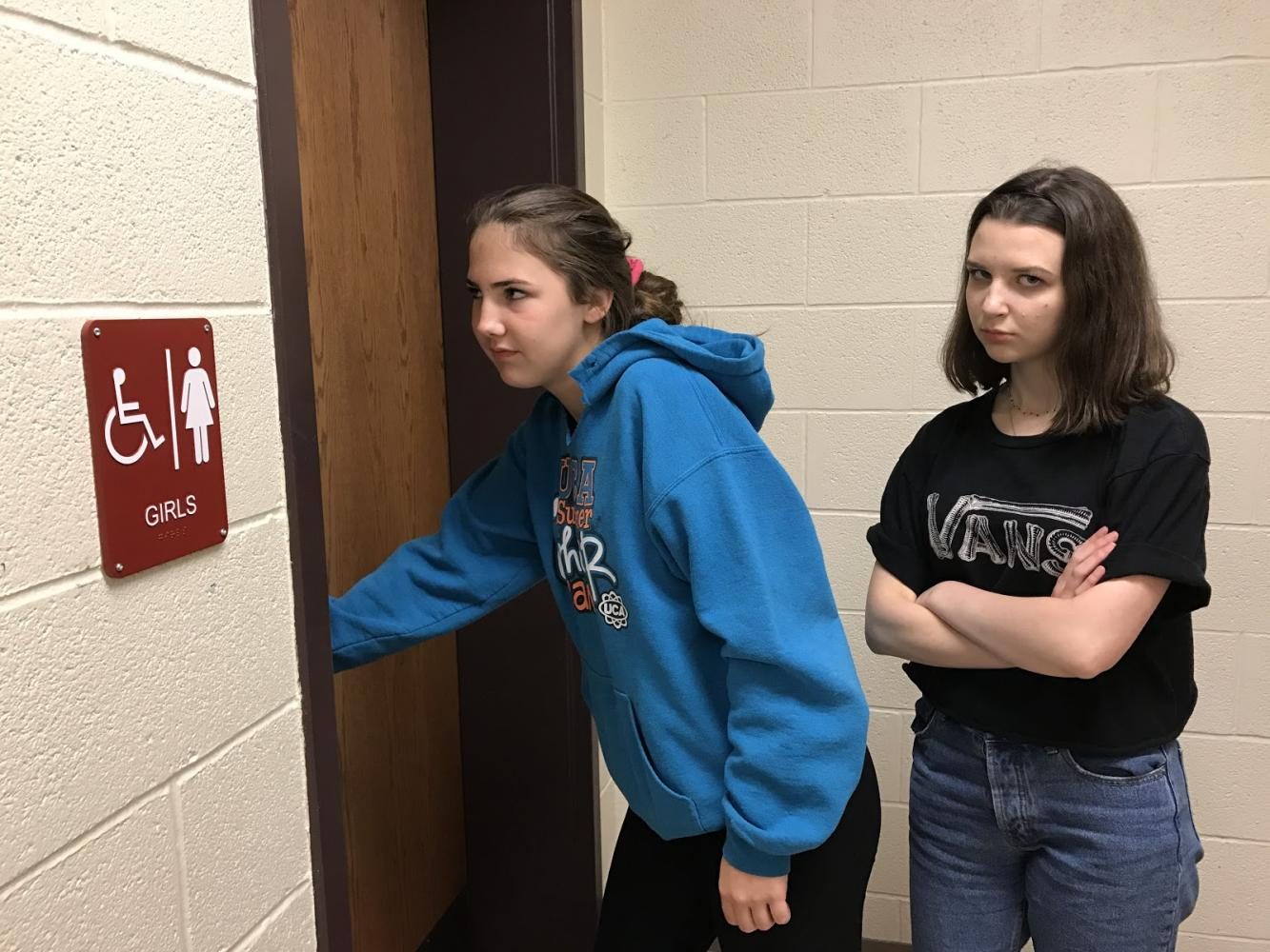 Daisy Tahan and Alexa Miceli try to use the bathroom in the science wing. They had to search for another bathroom because these are locked.