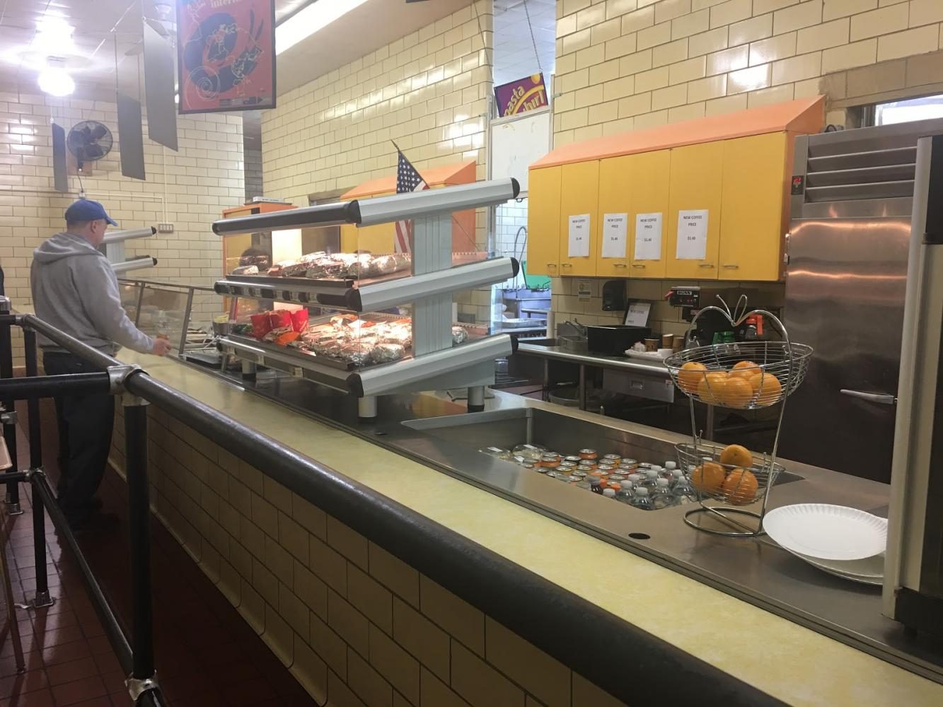 The cafeteria lunch line where all of the merchandise is held. Lantieris office, where he monitors the line, is behind the counter, out of frame.