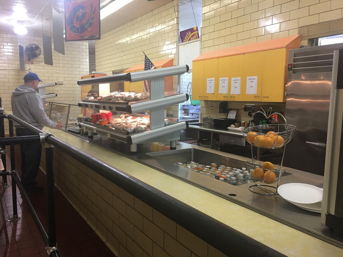 The cafeteria lunch line where all of the merchandise is held. Lantieri's office, where he monitors the line, is behind the counter, out of frame.