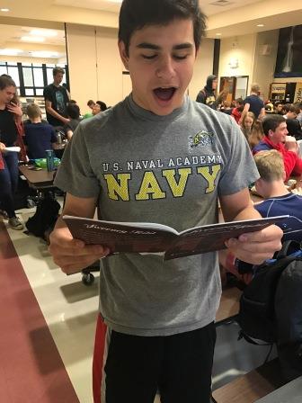 Concert Choir student Ben Katzman prepares for the concert by running through his music.