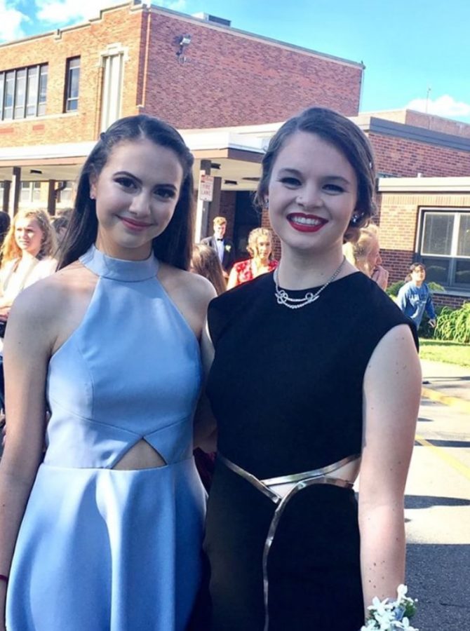 Alison Erani (left) poses with Alex Walter at junior prom last year. Erani was named a National Merit Award Semifinalist.