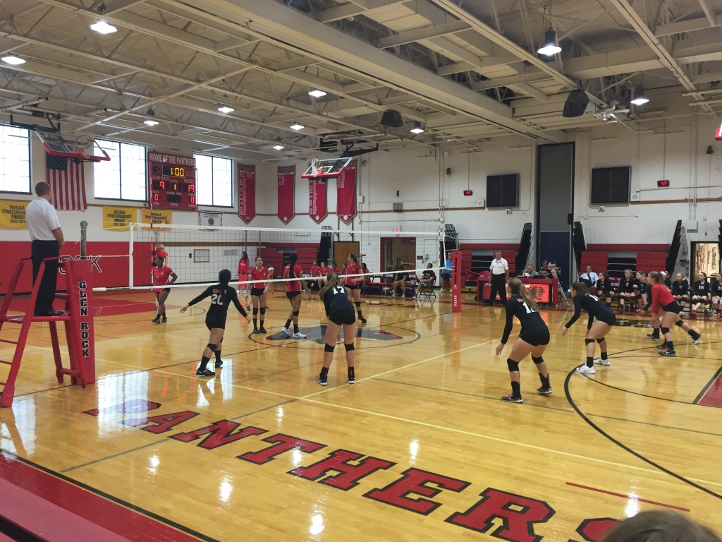 The varsity volleyball team prepares for a serve from Elmwood Park during the second match. Glen Rock lost 2-0 to Elmwood Park. This is the second time the volleyball team lost to Elmwood Park this season, also falling 2-0 in its first match.