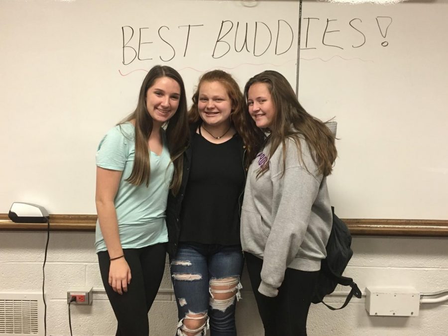 Sophie Moore (club member), Ana Lindley (club member), and Alaina Phelan (vice president) are all excited for the startup of the Best Buddies club. 