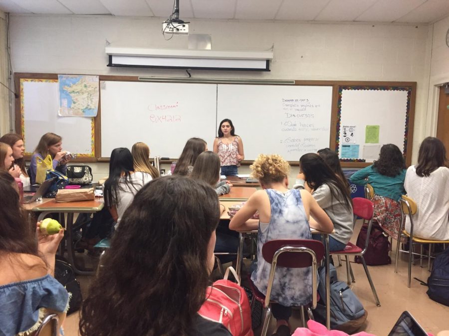 Club president, Abby Stern, explains to the club the videos they are about to view. Stern started the Glen Rock chapter of Girl Up this school year. Mrs. Taylor Ingis of the Spanish department is the acting teacher advisor. 