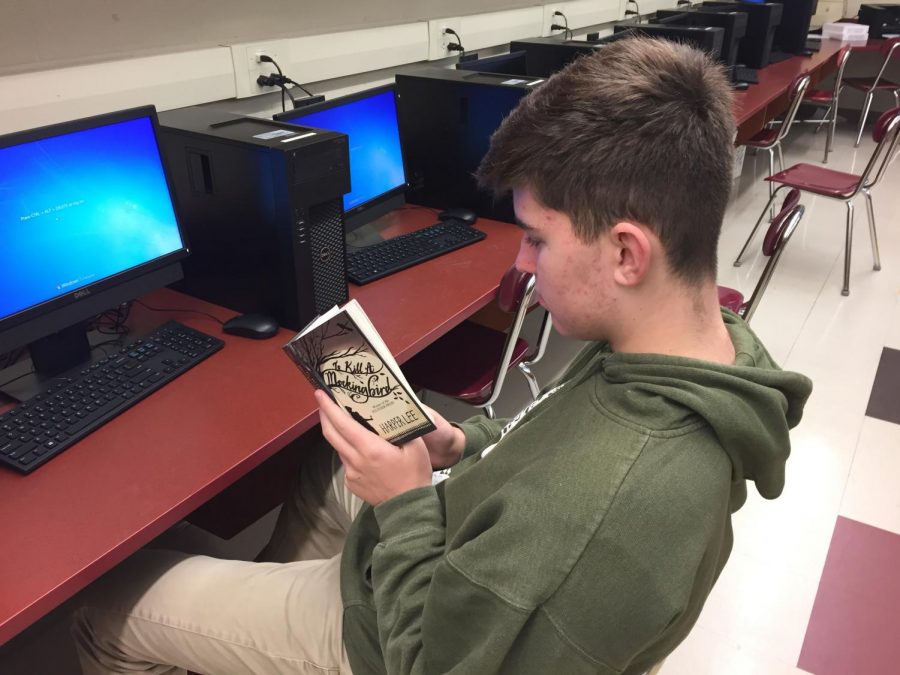 Evan Van Duffelen, junior at Glen Rock High School, read ¨To Kill a Mockingbird¨ during class.   To Kill a Mockingbird teaches students about social inequality and injustice, as well as the importance of education of the youth.