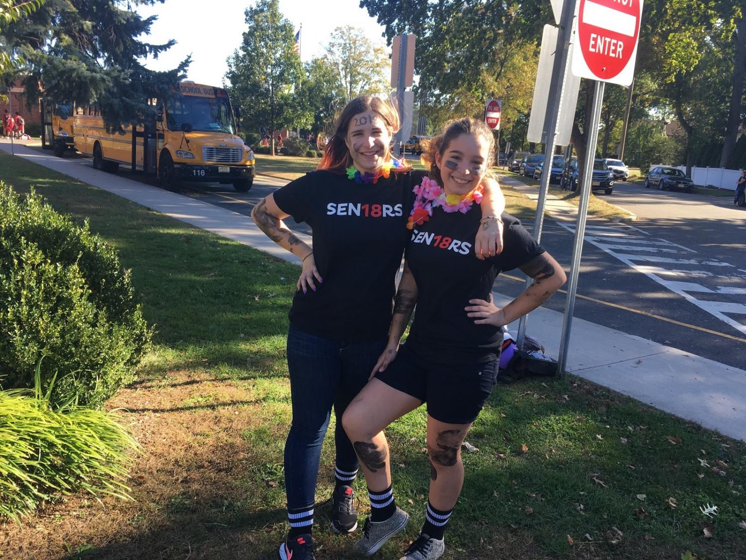 Appropriately dressed for the pep rally, Stella Pereira (left) and Lizzy Bonica (right) show off their school spirit even after class is over.