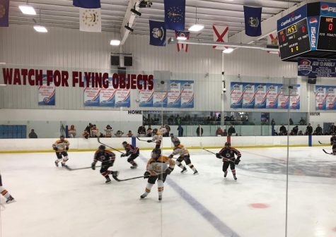 Varsity hockey wins season-opener