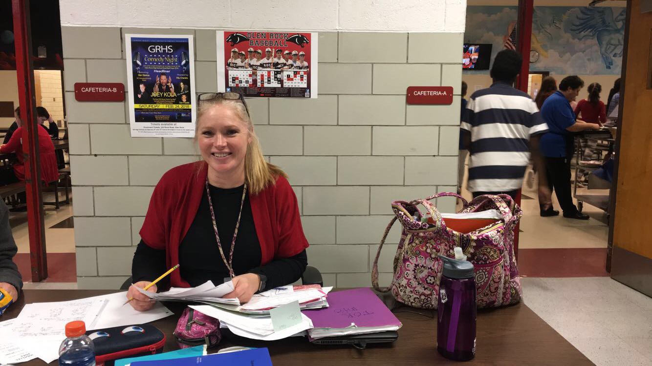 Special Education teacher, Stacie Gallo, sits at the table as she grades her students' papers. Before working at Glen Rock High school, she worked at a Child Development Center for seven years.