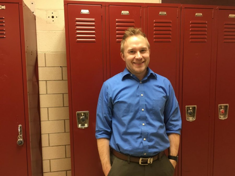 History teacher Tom Lyon poses in the halls of Glen Rock High School on Feb. 6. 