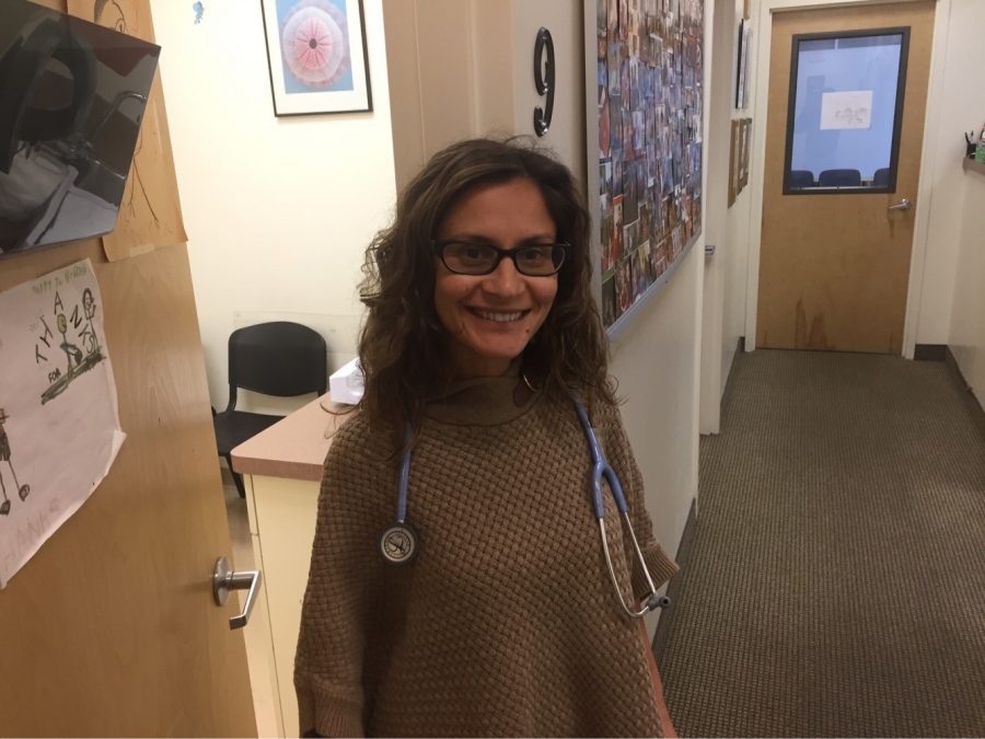 Alina Sumarokov M.D., stands in Tenafly Pediatrics, a doctor’s office that has been filled with flu patients. Sumarokov estimates that she has seen 500 to 600 kids with flu-like symptoms.