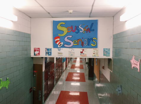 The seniors homecoming decorations hang in their hallway. Their theme is Seussical Seniors.