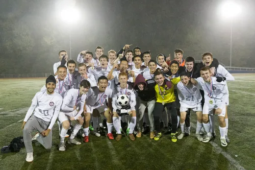The Glen Rock High School Varsity Soccer Team poses for a picture while celebrating their convincing 3-0 victory over Ramsey to win the trophy on the night of October 27, 2018 at the Bergen County Boys High School Soccer Tournament final.  

