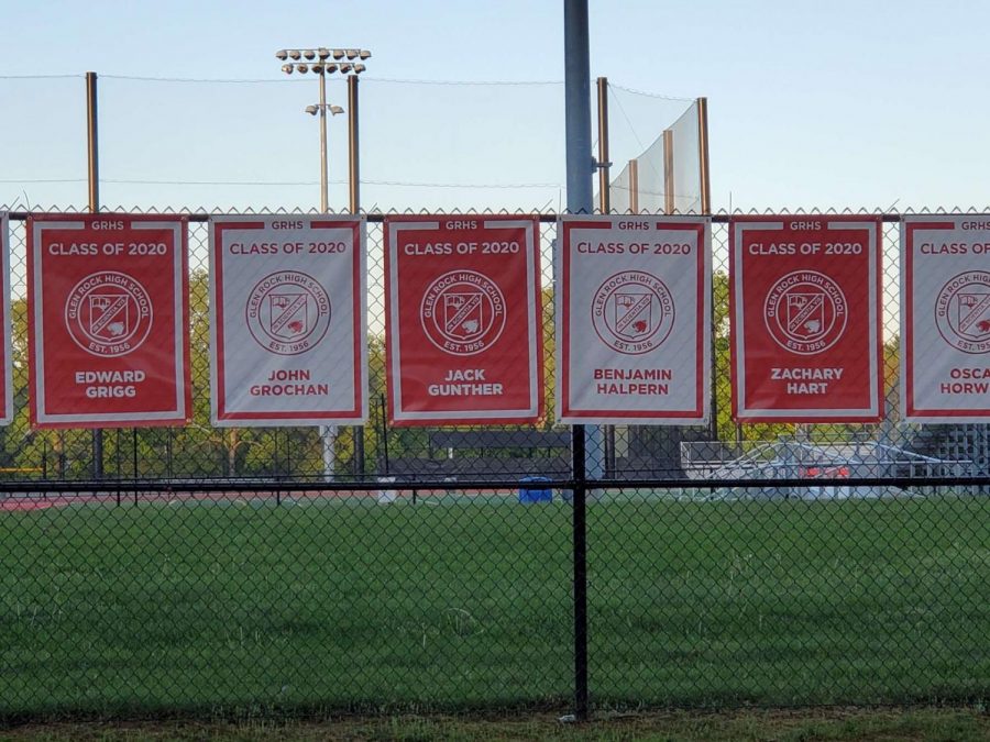 Banners have been hung up alongside the fences along the tennis courts and behind the upper turf field, with each banner saying the name of a graduating senior.