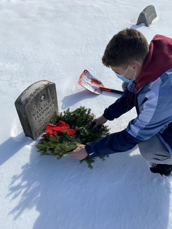 Jack Strawhorn lays a wreath.