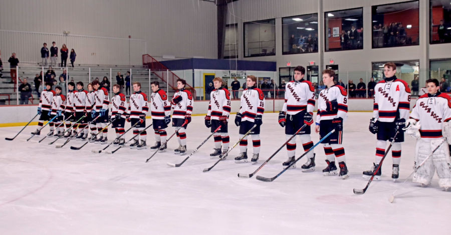 The 2019-2020 squad stands for the National Anthem before their matchup against West Essex. 