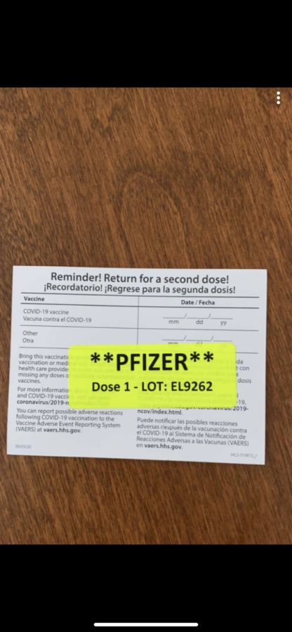 COVID-19+vaccine+recipients+receive+a+card+to+log+the+dates+of+when+they+received+their+first+and+second+doses.+