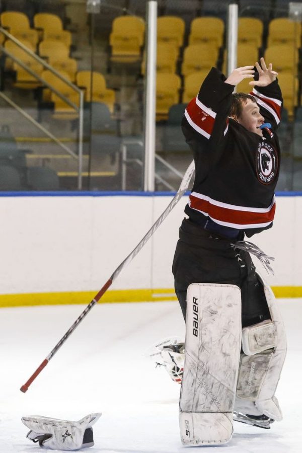 Alvino throws up his equipment in excitement moments after Glen Rock defeated Livingston 4-0 in the McInnis Cup. 